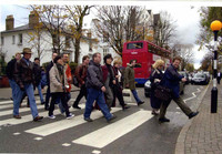 "In the Life" Beatles walk guide Richard P. leads a group across London's Abbey Road. Photo courtesy of Richard Porter.